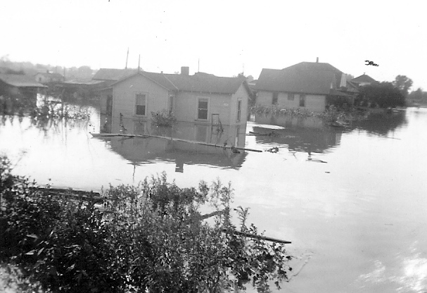 old photo of house flooded in 1935