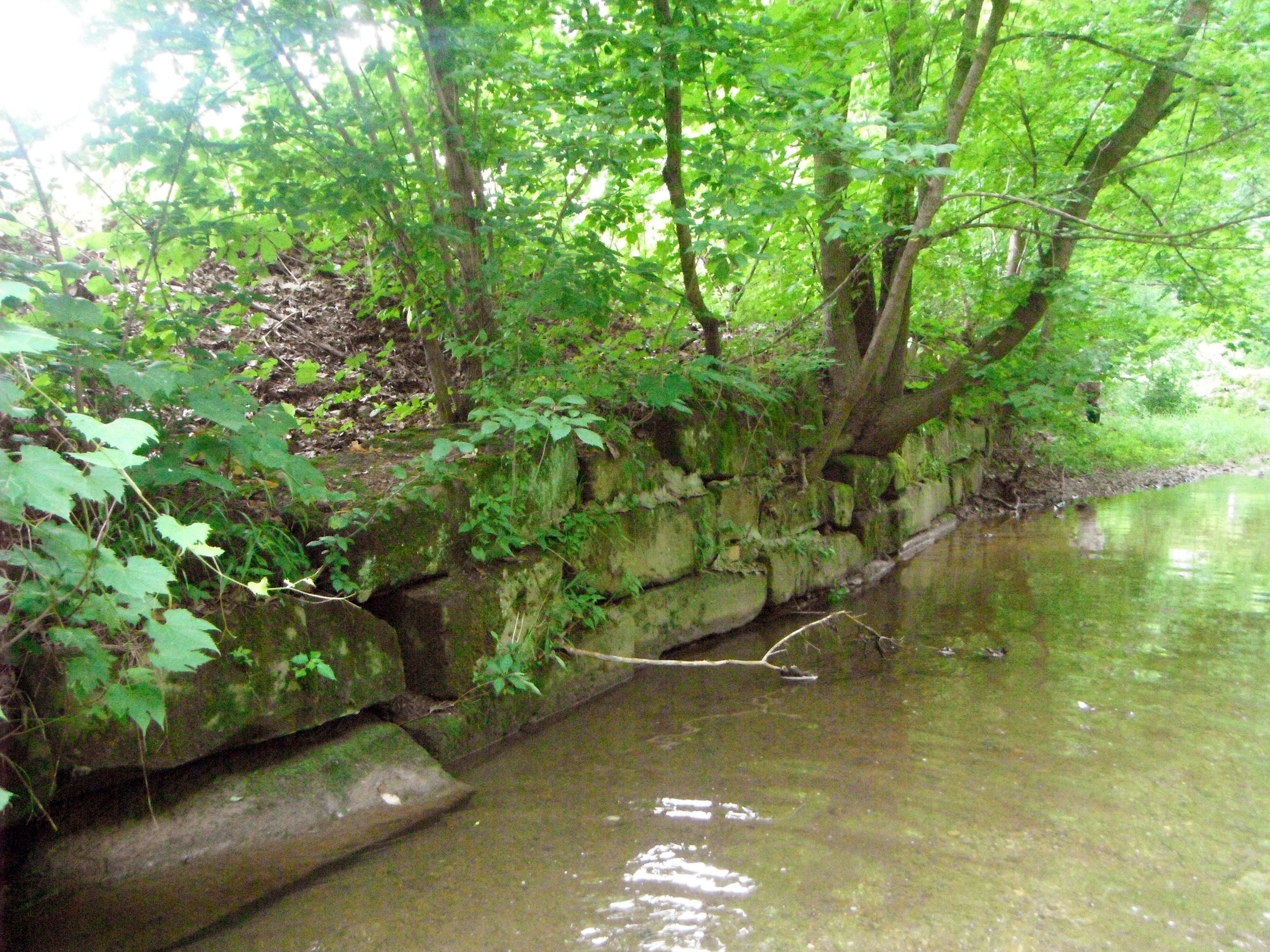 Retaining wall in stream